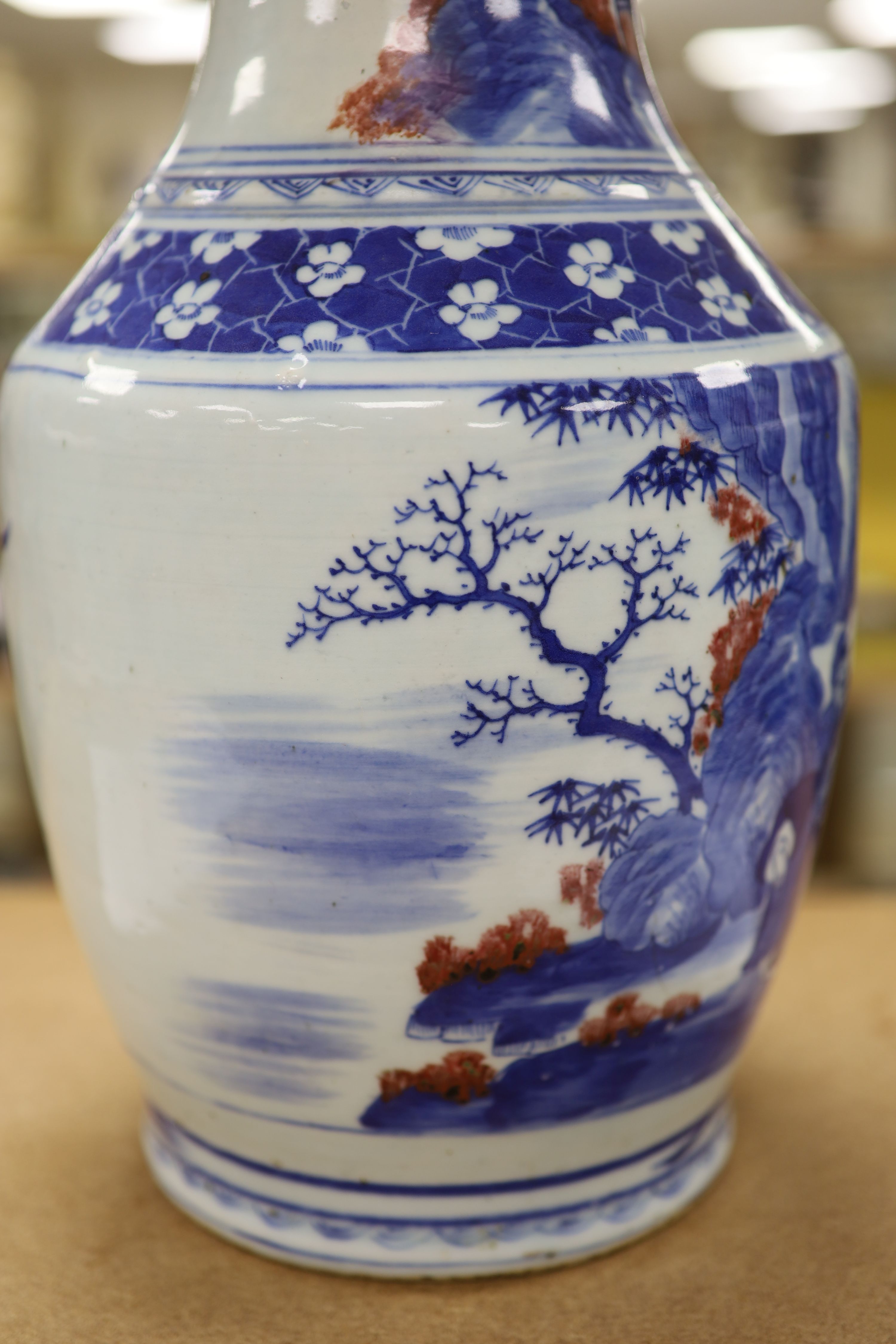 A large Chinese underglaze blue and copper red vase, height 41cm, restored neck